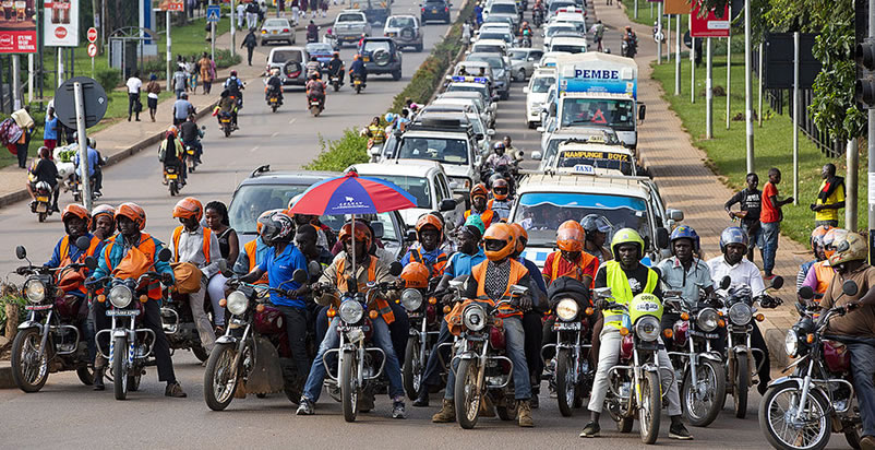 Motorbike taxis, known as boda bodas, are a primary means of transport in Uganda. Source: Entebbe Airport Express